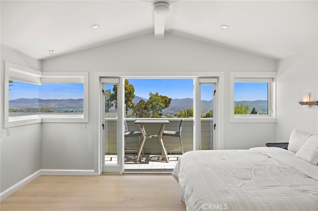 French doors lead to the balcony off the primary suite with beautiful mountain views. - 3203 Tyrol Drive, Laguna Beach CA 92651 - photo 21