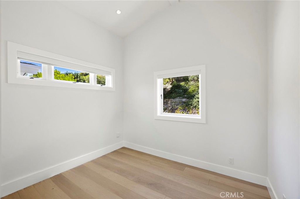 Upstairs Guest bedroom #2 with vaulted ceilings - 3203 Tyrol Drive, Laguna Beach CA 92651 - photo 29
