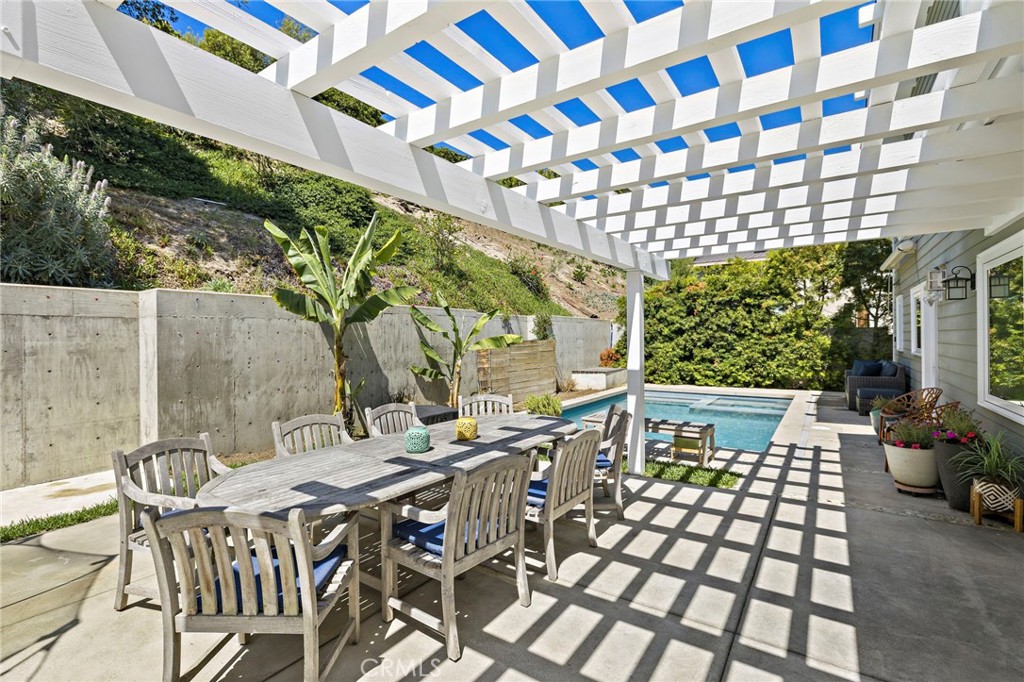 The backyard serves as a private sanctuary, thoughtfully designed for both relaxation and entertaining - 3203 Tyrol Drive, Laguna Beach CA 92651 - photo 32