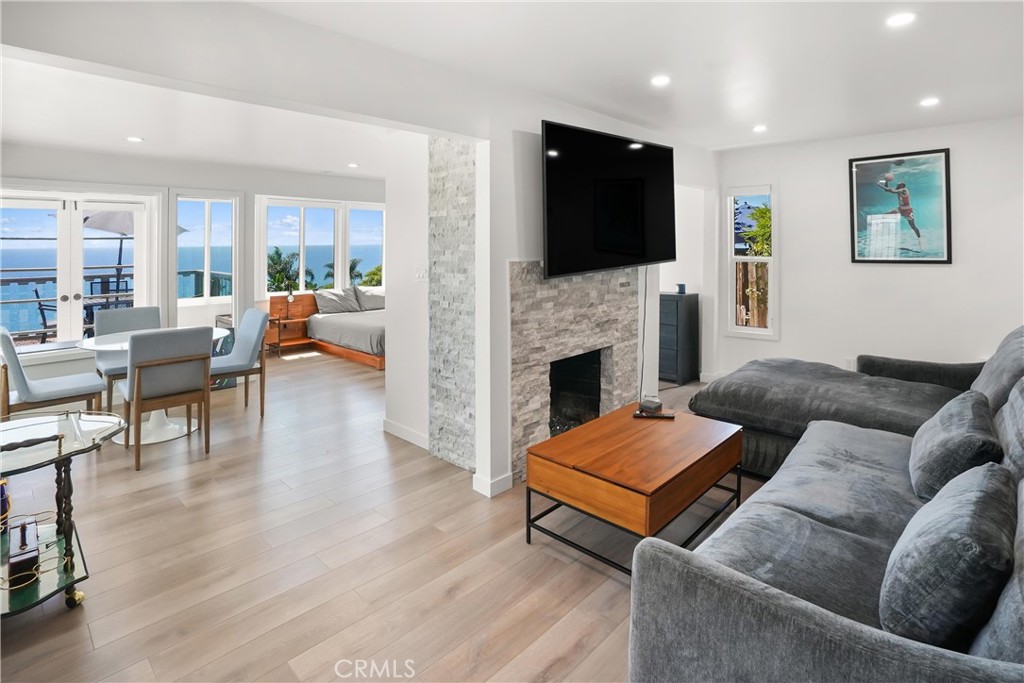 Lower unit fireplace - 32082 Coast Hwy, Laguna Beach CA 92651 - photo 19