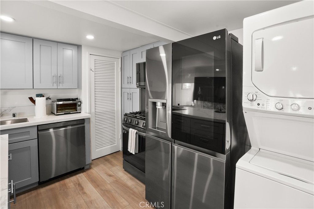 Lower level in unit washer and dryer - 32082 Coast Hwy, Laguna Beach CA 92651 - photo 20