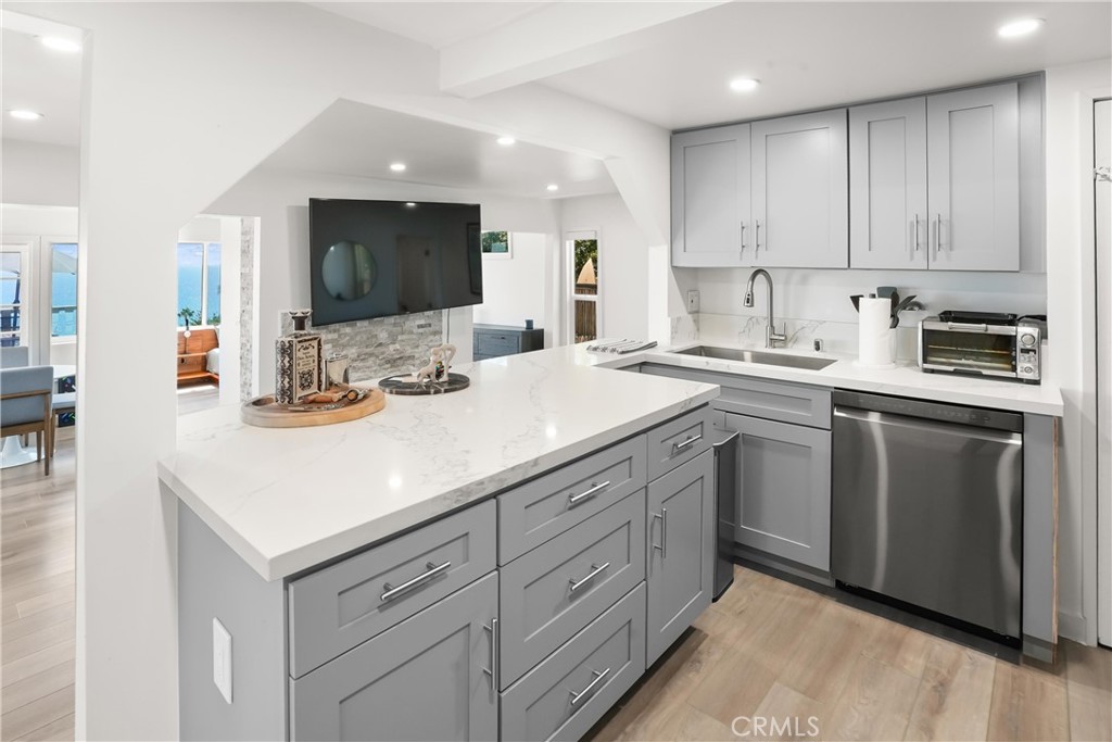 Lower unit kitchen - 32082 Coast Hwy, Laguna Beach CA 92651 - photo 22