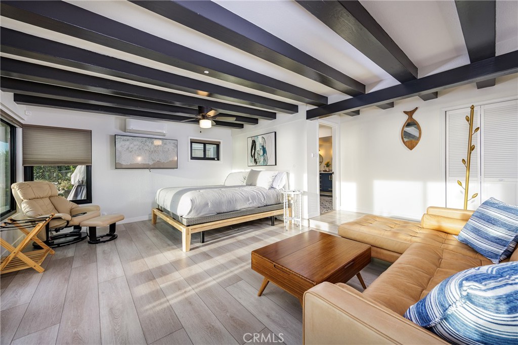 Primary suite has its own entrance and access to patio with ocean views - 32146 Coast Hwy, Laguna Beach CA 92651 - photo 5
