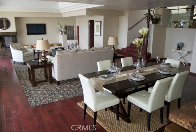 Spacious living room with hardwood floors, wood burning fireplace, formal dining area~ - 3216 Tyrol Drive, Laguna Beach CA 92651 - photo 1