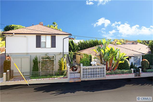 This well maintained and located building is located on the corner of Glenneyre and Los Olivos just 1 block to the beach - 325 LOS OLIVOS, Laguna Beach CA 92651 - photo 1