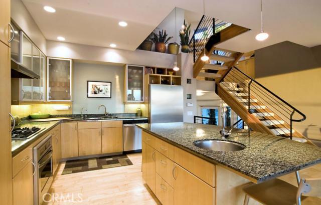 Open kitchen with Thermador appliances, center island and custom cabinetry - 326 Loma Terrace, Laguna Beach CA 92651 - photo 1
