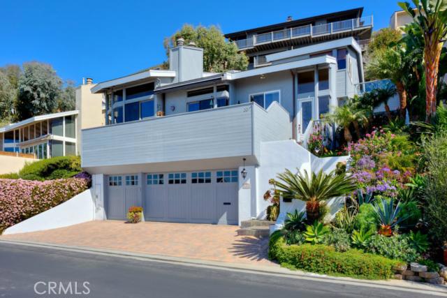 Beautifully landscaped, well maintained home in Three Arch Bay with panoramic ocean views! - 33 N Stonington Road, Laguna Beach CA 92651 - photo 1