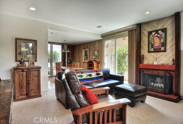 Very spacious living room with cozy fireplace and great floorplan! - 335 Cypress Drive, Laguna Beach CA 92651 - photo 1