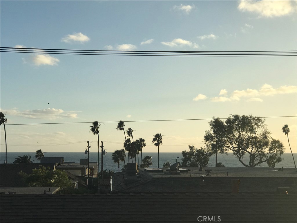 This beautiful townhouse condo is not only located in a great part of north Laguna, but it has this ocean view, too. - 339 Cypress Drive, Laguna Beach CA 92651 - photo 1