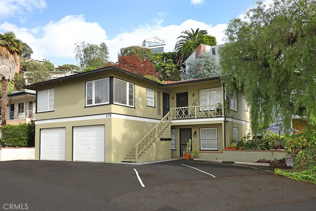 VERY CLEAN TRIPLEX ON PRIME DOWNTOWN CORNER LOT FEATURES TWO 1-BEDROOM UNITS (SEE EXAMPLE PHOTO) AND ANOTHER 2-BEDROOM U - 370 Loma Terrace, Laguna Beach CA 92651 - photo 1