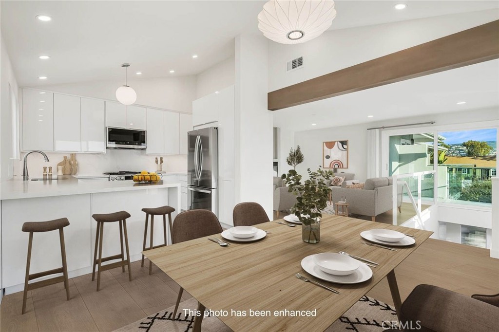 Dinning area and living area staged with furniture - 372 Locust, Laguna Beach CA 92651 - photo 1