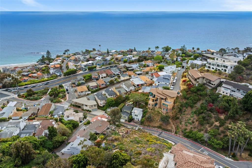 Northern view from drone photography. Please note, this image shows two lots. Lot for sale is closest to the ocean. Fenc - 375 Nyes Place, Laguna Beach CA 92651 - photo 9