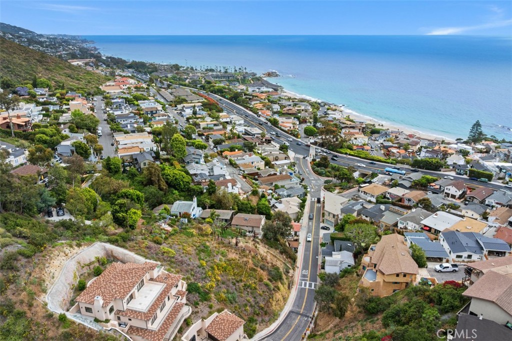 The current permitted plans have views from both the living area and deck as well as the primary bedroom and deck. Pleas - 375 Nyes Place, Laguna Beach CA 92651 - photo 11