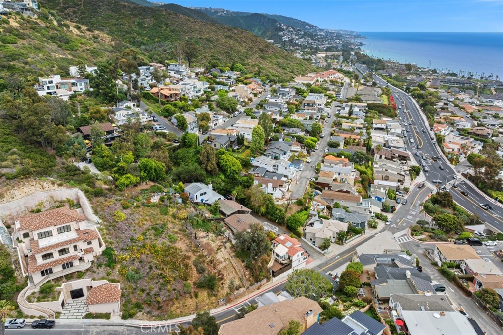 There is another beautiful home recently built just uphill from this lot. Please note, this image shows two lots. Lot fo - 375 Nyes Place, Laguna Beach CA 92651 - photo 12