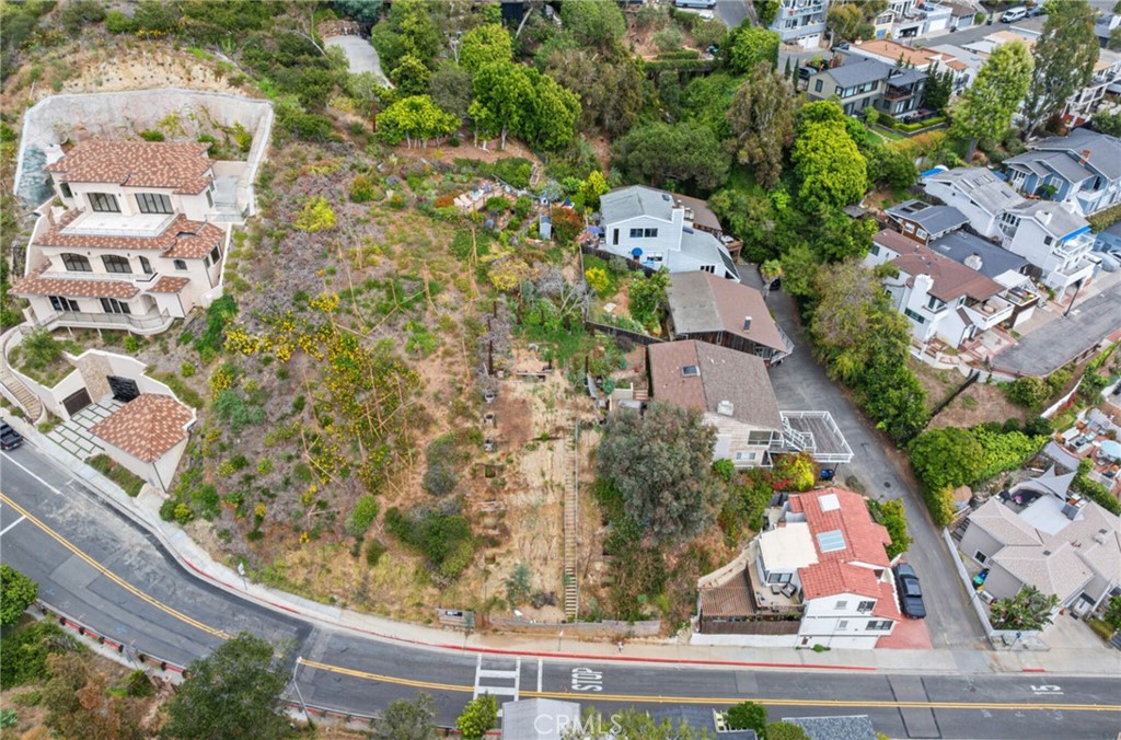 Lot in a beautiful location in an area already developed with beautiful homes. Please note, this image shows two lots. L - 375 Nyes Place, Laguna Beach CA 92651 - photo 13