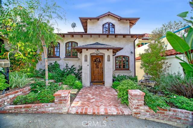 Live the relaxed coastal lifestyle in this spectacular European inspired residence found in Woods Cove and just 3 blocks - 385 Flora Street, Laguna Beach CA 92651 - photo 1