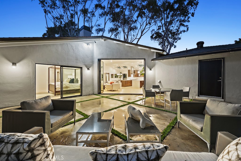 The backyard oasis is a true sanctuary offering total privacy and the ideal setting for entertaining al fresco. - 387 El Camino Del Mar, Laguna Beach CA 92651 - photo 1