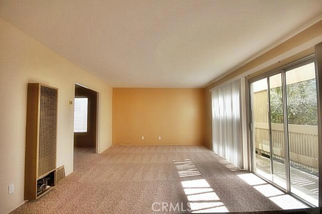 Large living room with balcony - 396 Cypress Drive E, Laguna Beach CA 92651 - photo 1