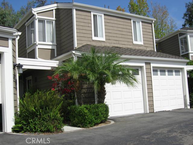 Inviting housing complex with courtyard entry, 1 direct access garage & 1 detached - 404 San Nicholas Court, Laguna Beach CA 92651 - photo 1