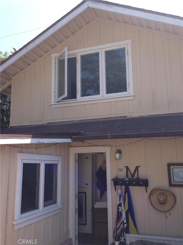 Front entry door and windows to the loft above. - 409 Jasmine Street B--Loft, Laguna Beach CA 92651 - photo 1