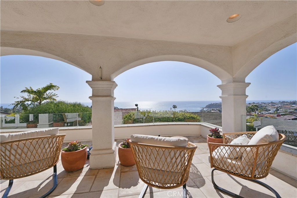 Day or night, the terrace always has an amazing view of the Pacific. - 432 Emerald Bay, Laguna Beach CA 92651 - photo 1