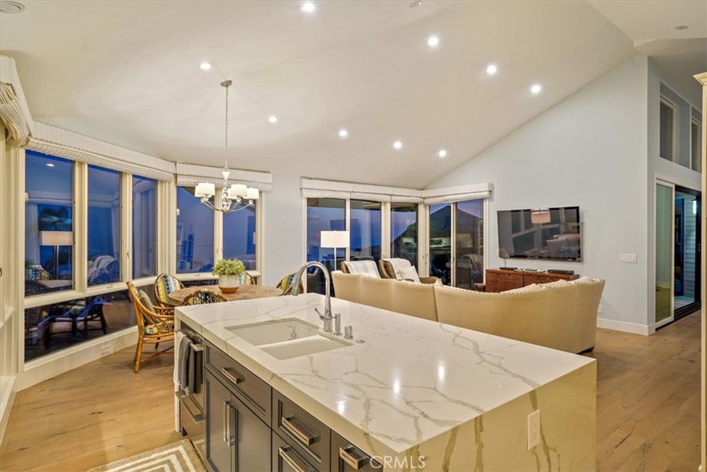 Kitchen Open to Family Room - 437 Emerald Bay, Laguna Beach CA 92651 - photo 7
