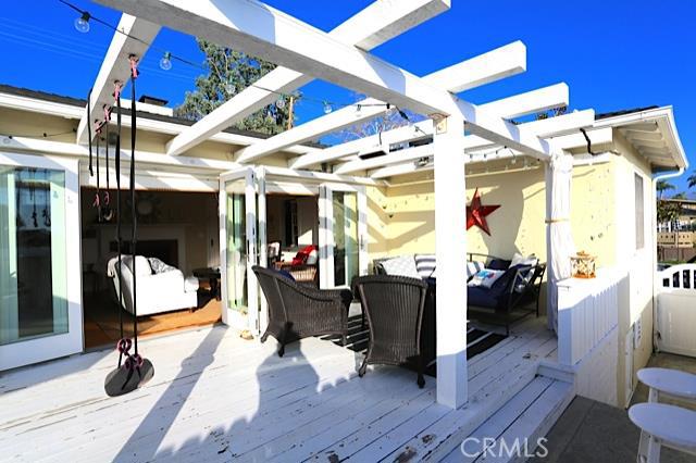 This home is ideal for Indoor/Outdoor living. The rustic feel only adds to the charm of this darling North Laguna cottag - 465 Monterey Drive, Laguna Beach CA 92651 - photo 1
