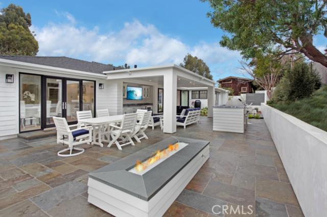 The outdoor space is finished with Pennsylvania Blue Stone Flooring, 41” Viking Professional BBQ and a custom bar table - 476 El Bosque, Laguna Beach CA 92651 - photo 1