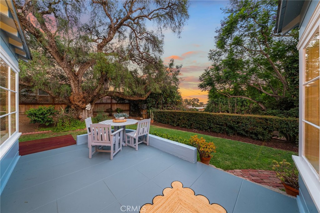 Sunset view of patio/yard from front door - 477 Hill, Laguna Beach CA 92651 - photo 27