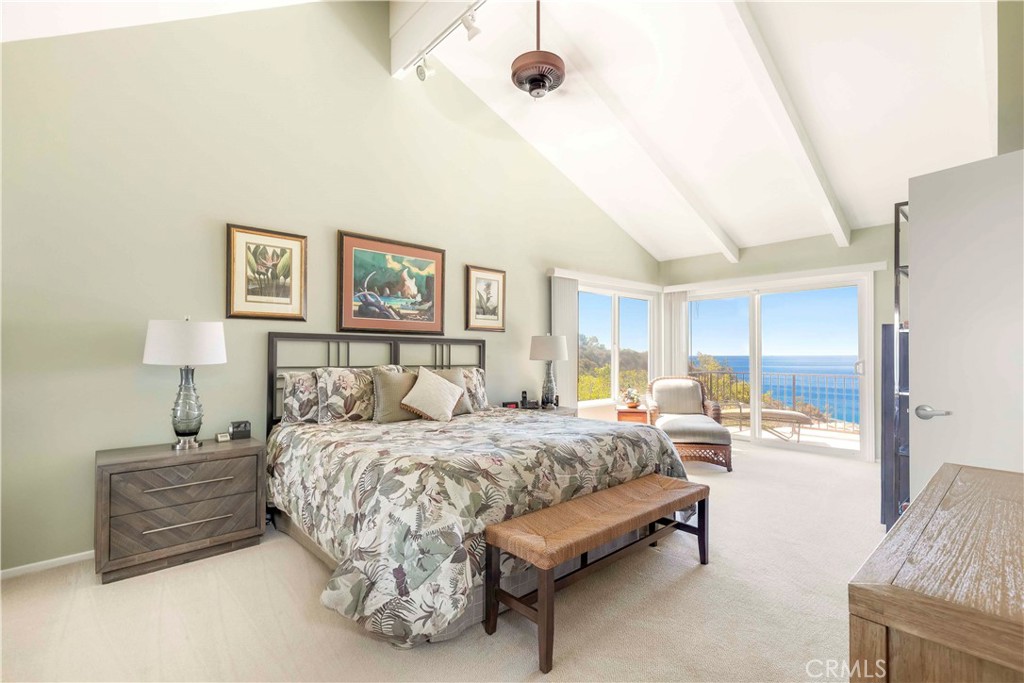 Serene Primary Suite with unobstructed ocean views, direct access to deck for sunsets and plenty of room to chill. - 480 Nyes Place, Laguna Beach CA 92651 - photo 1
