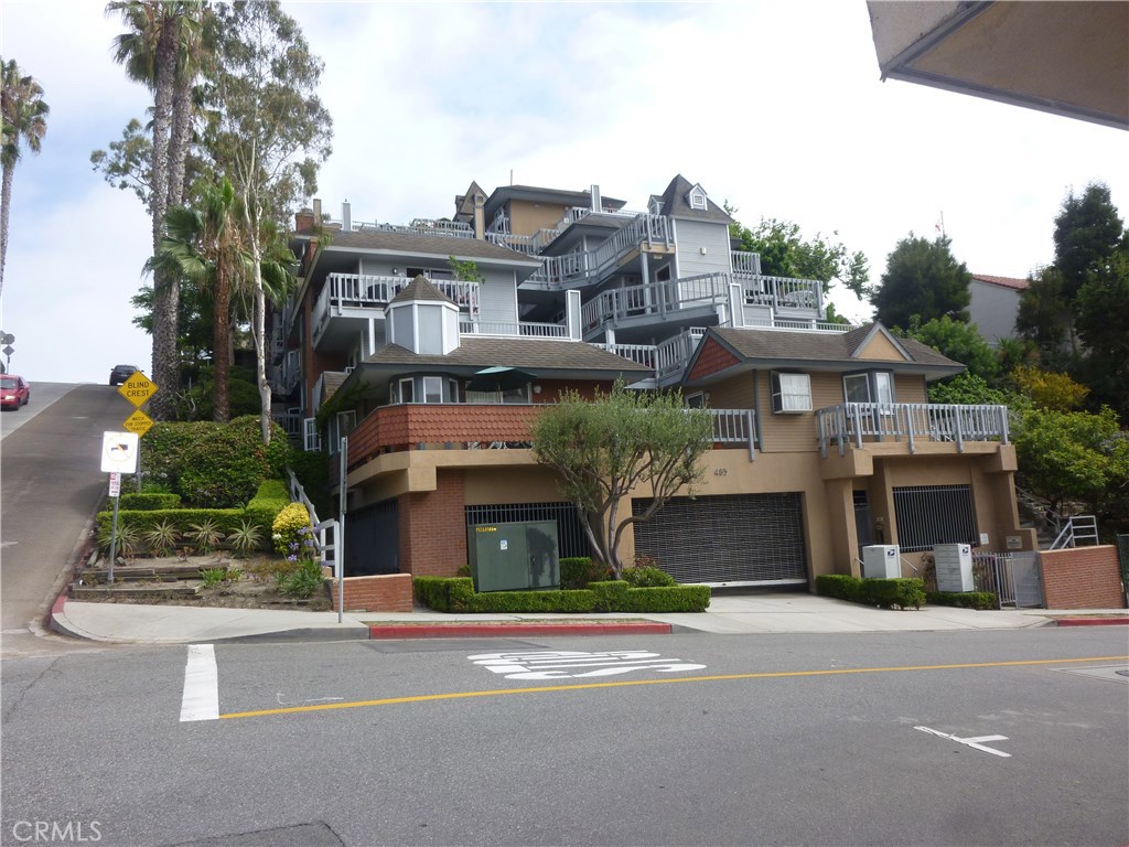 Corner Mermaid and Third St. Parking garage for #724 is up hill to alley behind building. Condo is on top floor of build - 485 Mermaid Street 724, Laguna Beach CA 92651 - photo 1