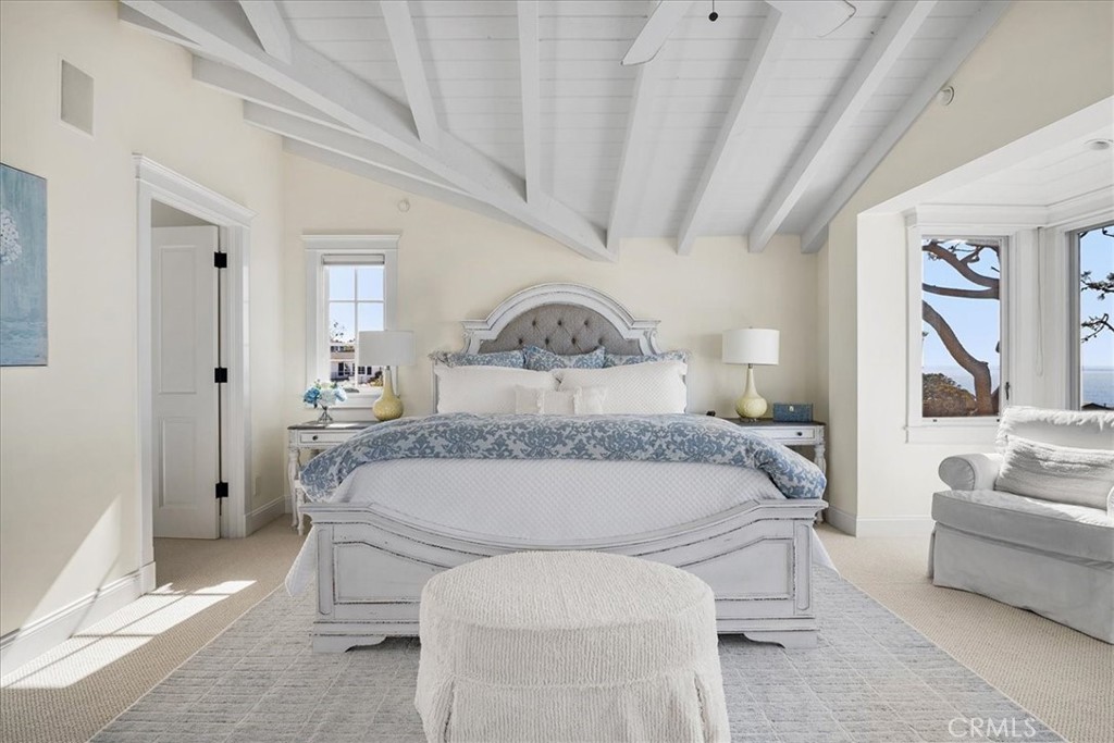 Upstairs primary bedroom with ensuite bath and large walk in closet. - 50 N La Senda Drive, Laguna Beach CA 92651 - photo 26