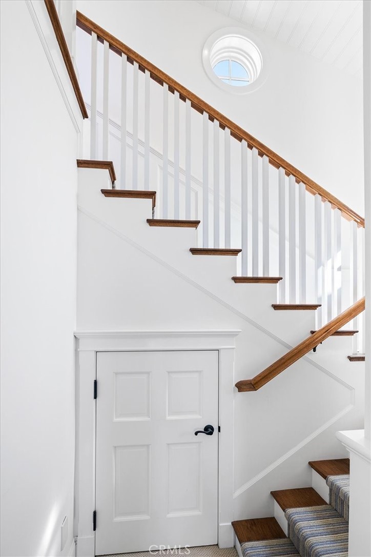 Stairs leading down to middle and lower levels. - 50 N La Senda Drive, Laguna Beach CA 92651 - photo 31