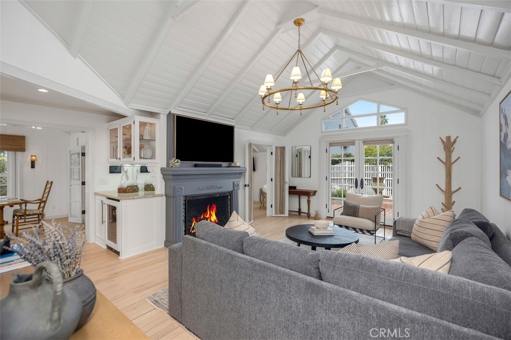 Home flows effortlessly from living room into kitchen and dining room space. - 501 Lombardy Lane, Laguna Beach CA 92651 - photo 7