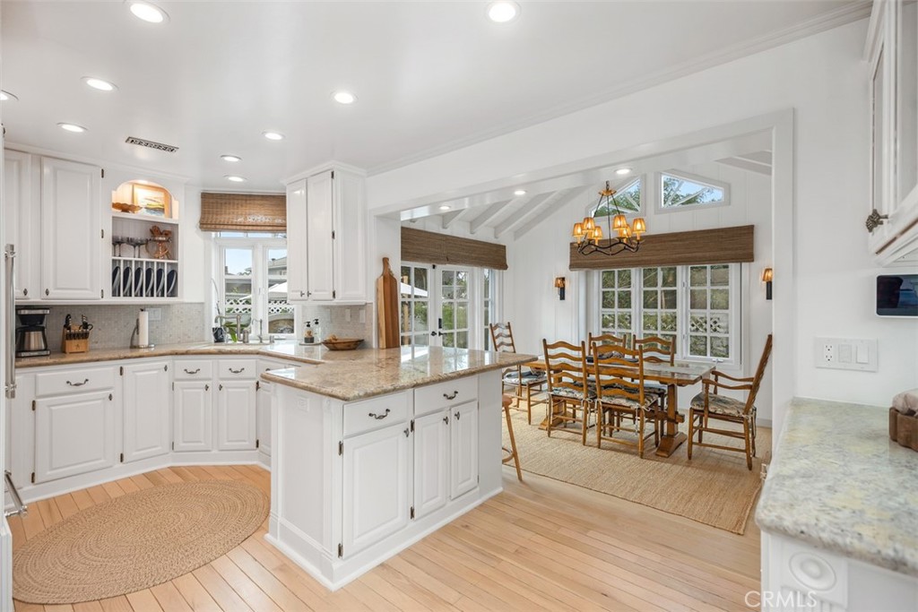 Kitchen fully stocked with all of your kitchen needs as well as a wet bar nearby. - 501 Lombardy Lane, Laguna Beach CA 92651 - photo 8