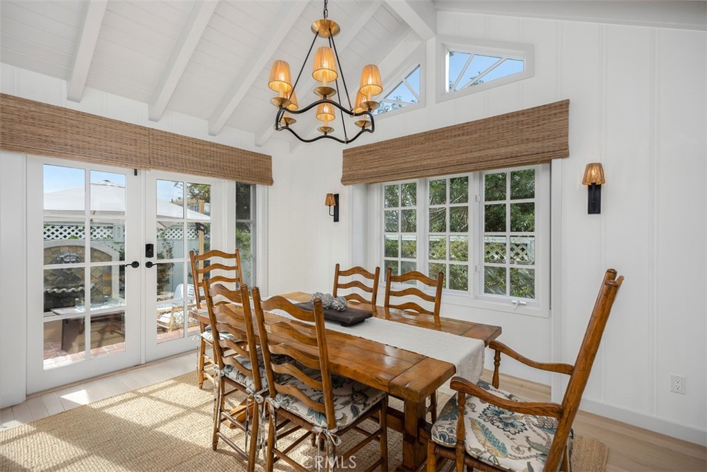 Charming dining room space with attention to detail with lighting. - 501 Lombardy Lane, Laguna Beach CA 92651 - photo 12