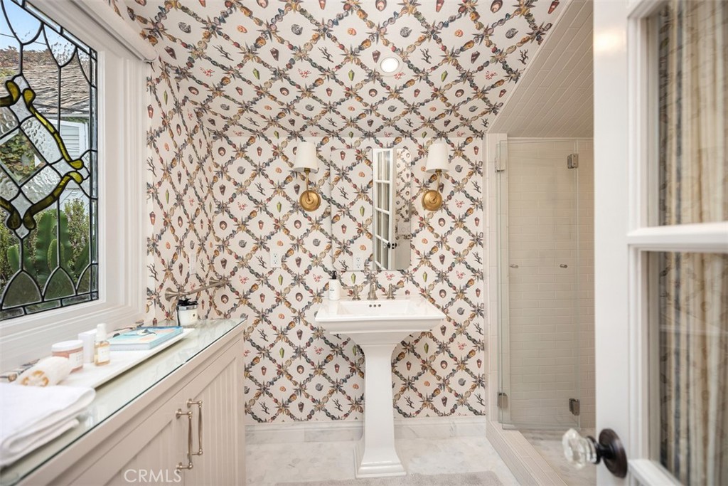 First full bath off of living room space with gorgeous wall paper and attention to detail. Very spa like. - 501 Lombardy Lane, Laguna Beach CA 92651 - photo 17