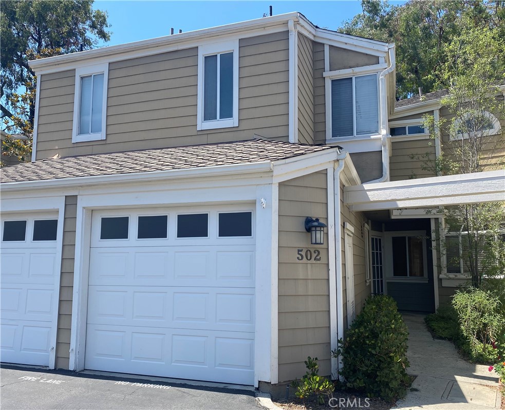 Front of condo with direct access, one car garage. - 502 San Nicholas Court, Laguna Beach CA 92651 - photo 1