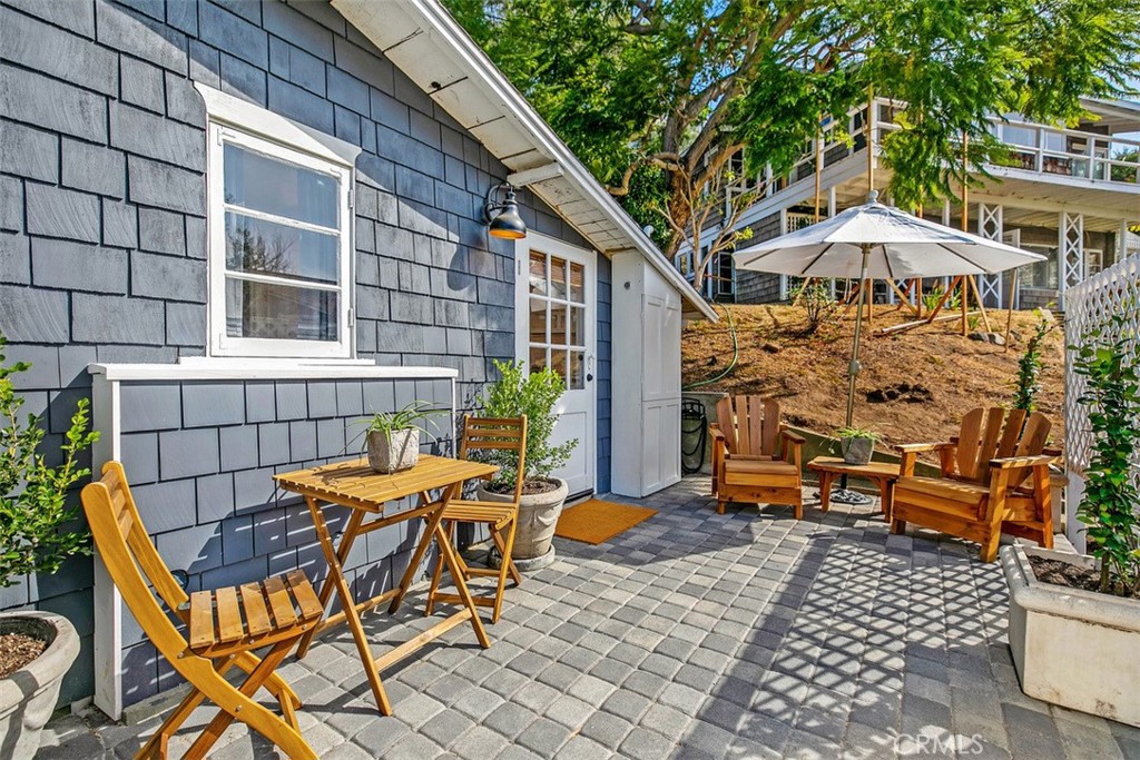 Side patio to use for entertaining or relaxing. - 509 Diamond Street, Laguna Beach CA 92651 - photo 10