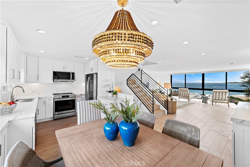 NEWLY REMODELED DOWN TO STUDS. ALL NEW FURNISHINGS AND APPLIANCES. MOVE IN READY! - 51 Blue Lagoon, Laguna Beach CA 92651 - photo 1