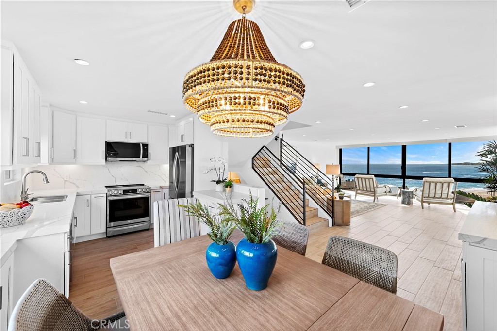 NEWLY REMODELED DOWN TO STUDS. ALL NEW FURNISHINGS AND APPLIANCES. MOVE IN READY! - 51 Blue Lagoon, Laguna Beach CA 92651 - photo 1