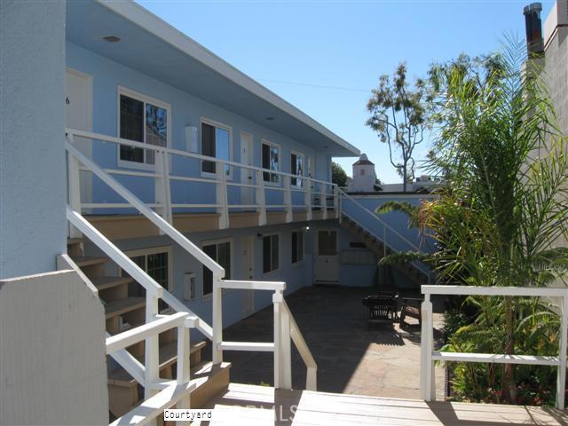 Courtyard View; #4 is upper in front, facing Glenneyre; Ocean View - 510 GLENNEYRE Street 4, Laguna Beach CA 92651 - photo 1