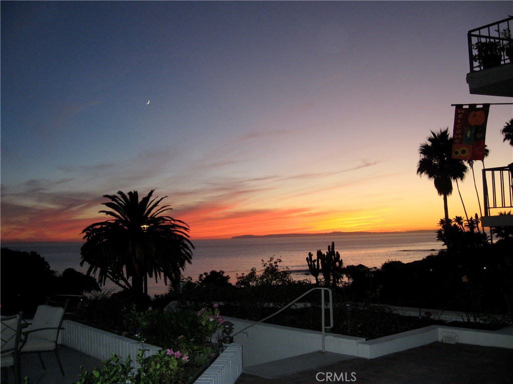 Sunset view from patio - 520 102 Cliff Dr, Laguna Beach CA 92651 - photo 1