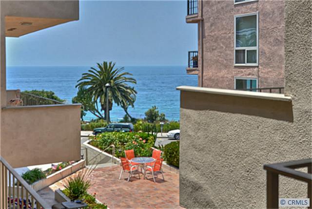 View from condo of blue water ocean and park vistas. - 520 CLIFF Drive 203, Laguna Beach CA 92651 - photo 1