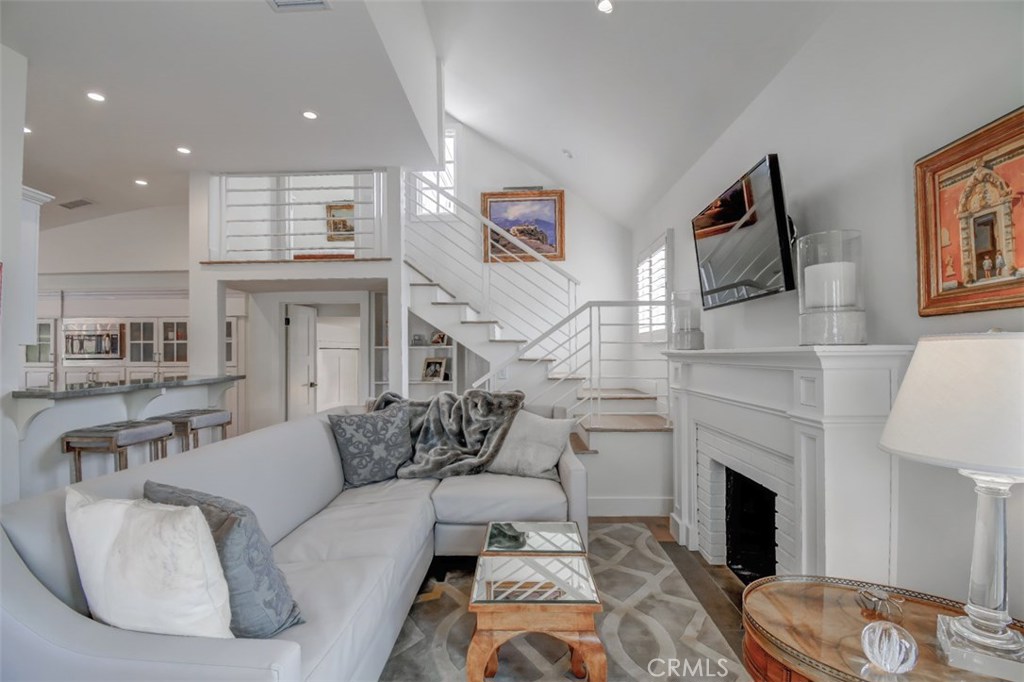 Family/Living Room open to Kitchen with steps leading to master suite & upstairs deck with view... - 521 Seaview Street, Laguna Beach CA 92651 - photo 1