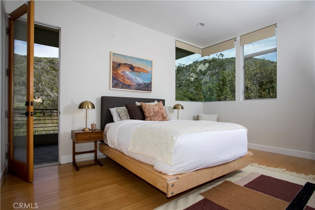 NORTH EAST CORNER- LOWER LEVEL BEDROOM OPEN UP TO DECK - 533 Temple Hills Drive, Laguna Beach CA 92651 - photo 14