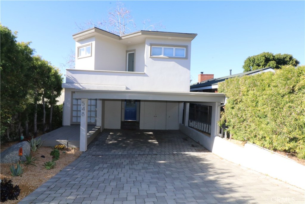 Double carport and long driveway provide lots of off street parking - 548 Agate Street, Laguna Beach CA 92651 - photo 1