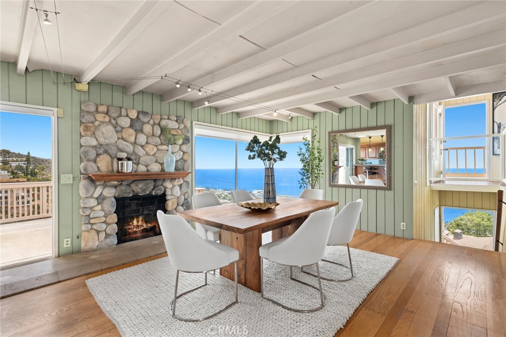 Ideal as a main or second home, the three-bedroom, three-bath design spans approximately 2,186 square feet and boasts wo - 559 Alta Vista Way, Laguna Beach CA 92651 - photo 1