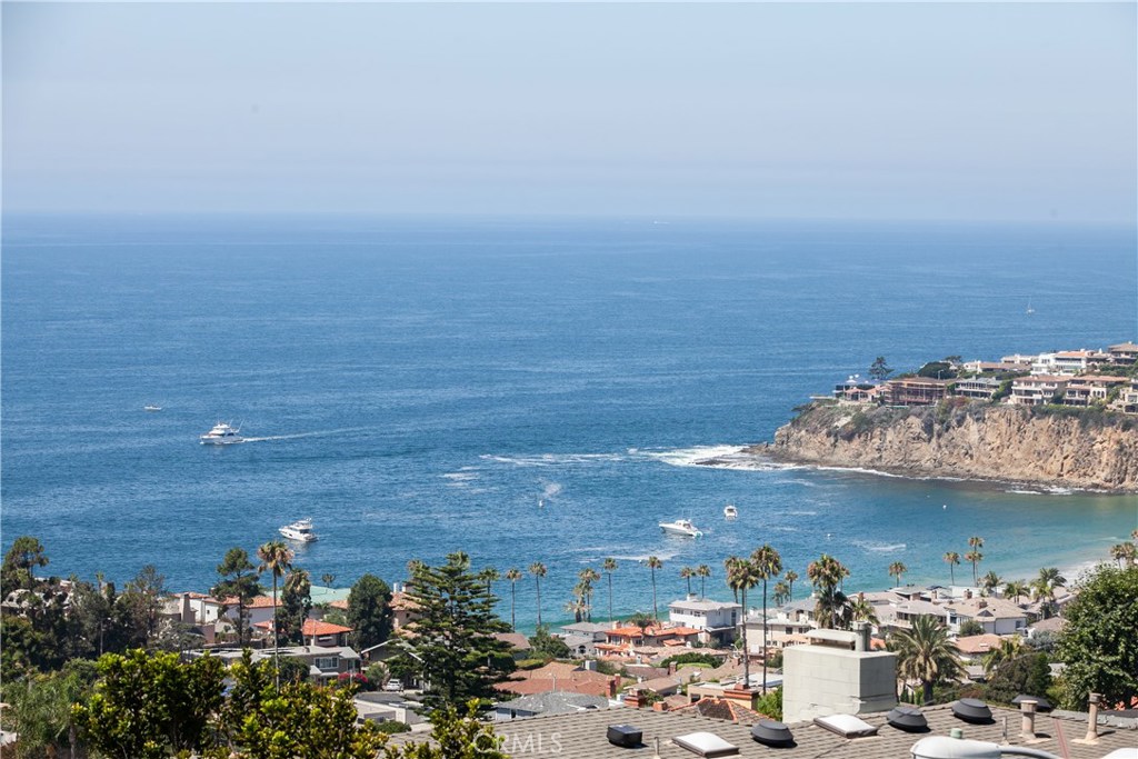 Panoramic coastline views including Emerald Bay. - 567 Dunnegan Place, Laguna Beach CA 92651 - photo 1