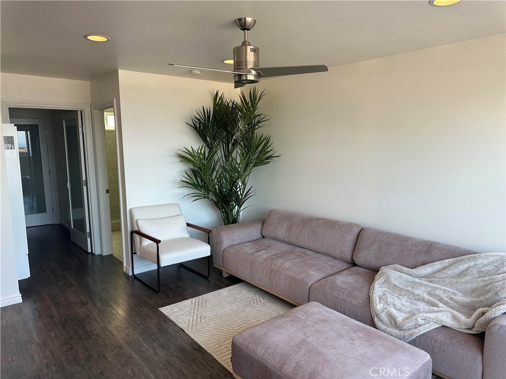 Living room leades to bedroom and laundry - 577 Ramona A, Laguna Beach CA 92651 - photo 7
